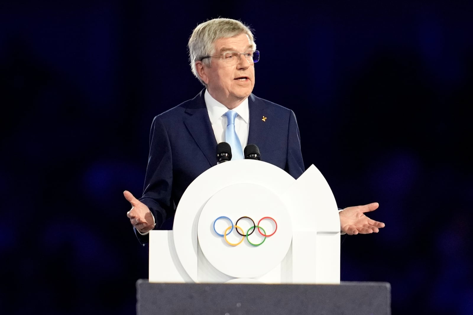 FILE - IOC President Thomas Bach addresses the audience during the 2024 Summer Olympics closing ceremony at the Stade de France, Aug. 11, 2024, in Saint-Denis, France. (AP Photo/Ashley Landis, File)