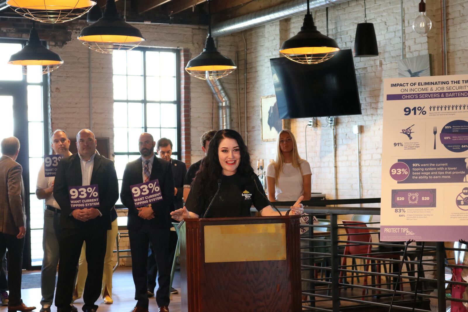 Lindsay O’Dell, a bartender at Submarine House's Huber Heights location, voices opposition to a possible ballot measure by One Fair Wage to raise minimum wage for Ohio tipped workers. O'Dell made her remarks during an Ohio Restaurant & Hospitality Alliance press conference at Jackie O's on Fourth in Columbus Tuesday, May 21, 2024. CONTRIBUTED