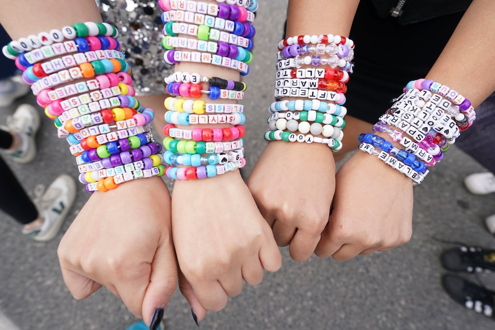 FILE - Taylor Swift fans display bracelets outside Toronto's Rogers Centre before going to see Taylor Swift perform on Nov. 14, 2024. (Chris Young/The Canadian Press via AP, File)