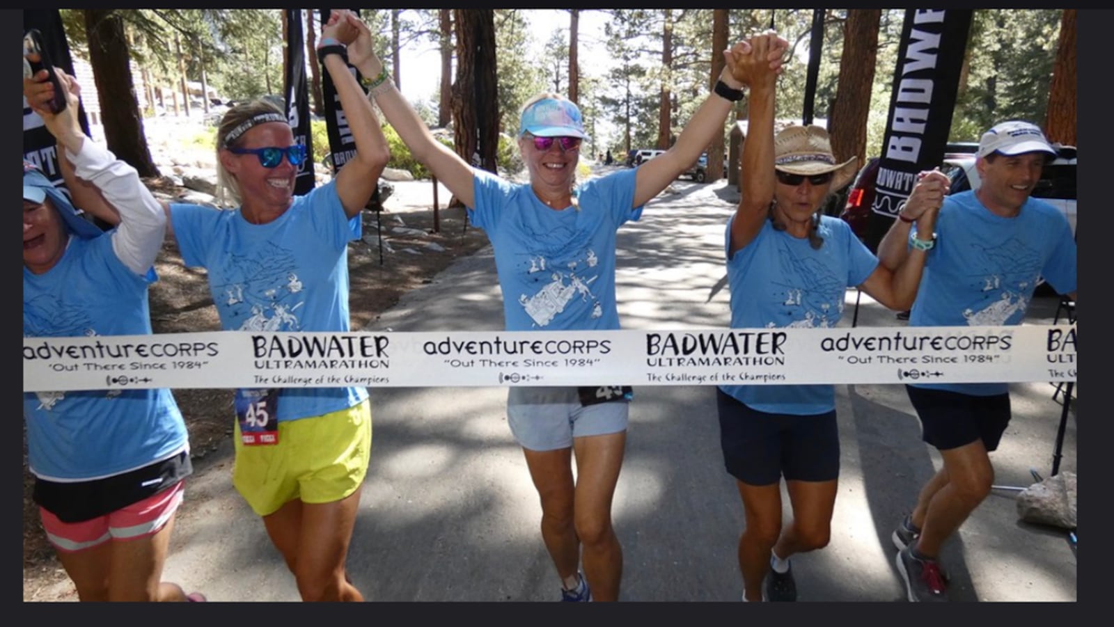 Aneta Zeppettella, center, finishing the 135 mile Badwater run across  Death Valley to Mt Whitney Portal in California in July 2021. She is surrounded by her support team, from left, Leanne Hood , Carissa Derr,  Ruth Kohstall, and David Corfman. CONTRIBUTED