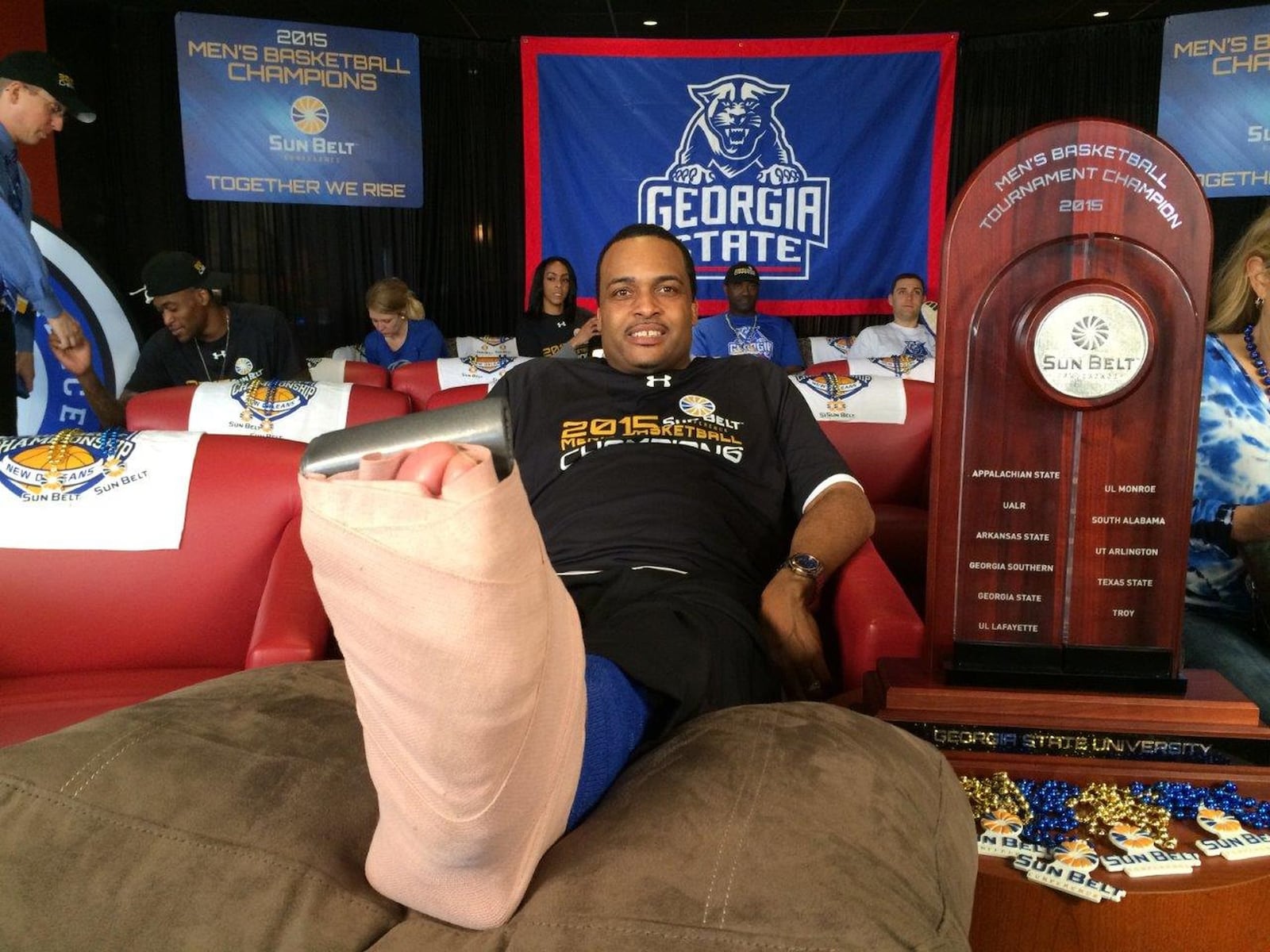 GSU coach Ron Hunter shows his injured foot after Sun Belt Championship game March 15, 2015