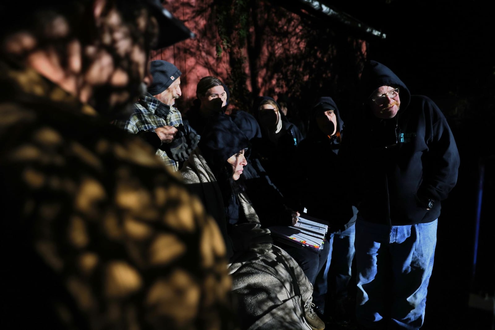 A new movie, "Water's Edge", is being filmed around the area including at Hueston Woods State Park, Middletown and a private farm in Preble County.  Crew members, including director Lana Read,  gather around to view a scene. NICK GRAHAM/STAFF