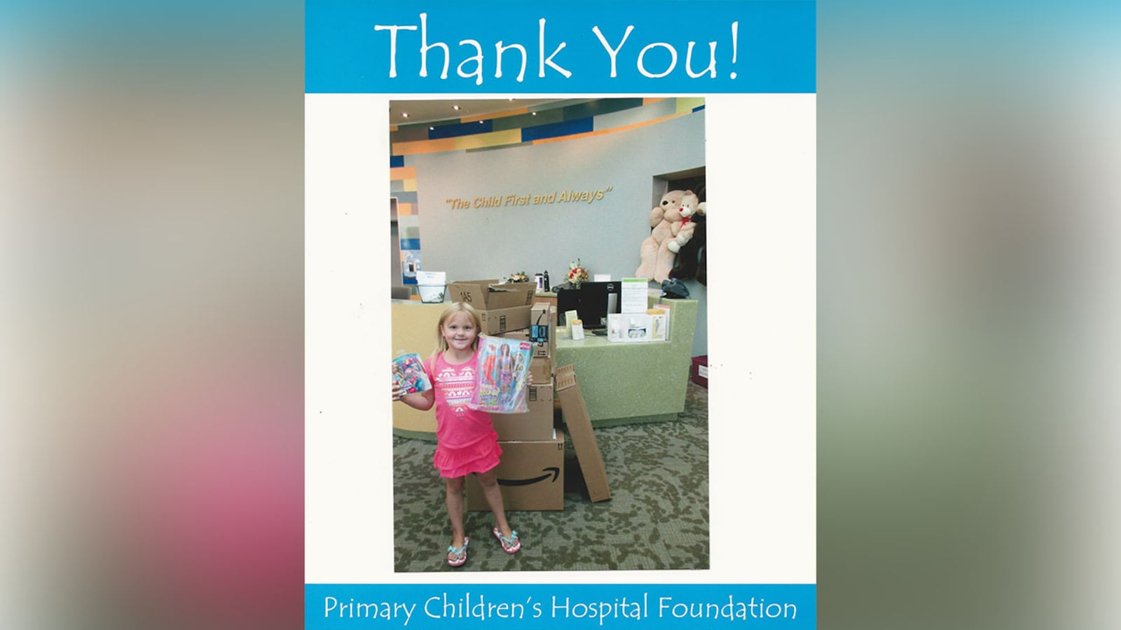 Katelyn Lunt, 6, poses with the toys she ordered on Amazon after donating them to Primary Children's Hospital in Salt Lake City, Utah.