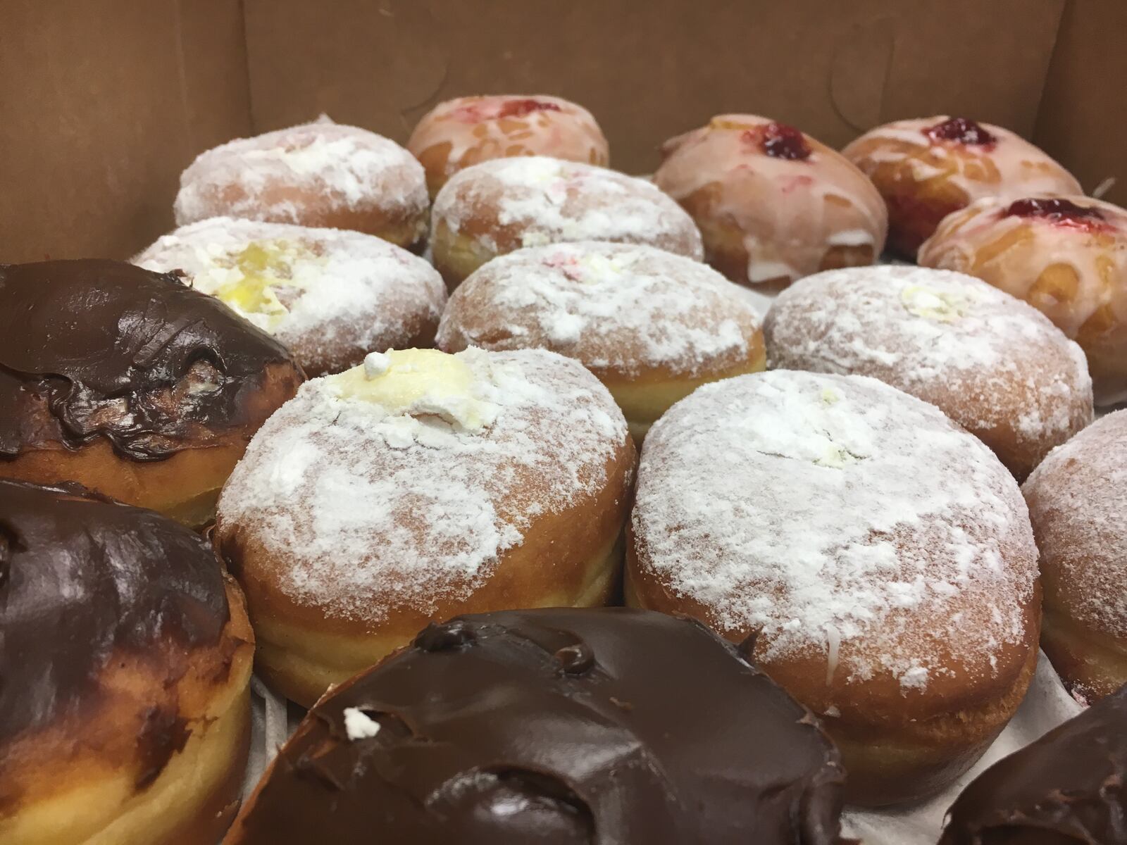 Traditionally, Paczki were filled with lemon cream, but have since evolved into a wide variety of flavors.