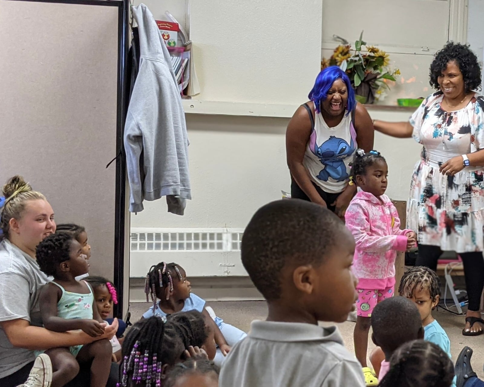 Kim Jarvis, right, helps lead a children's class.