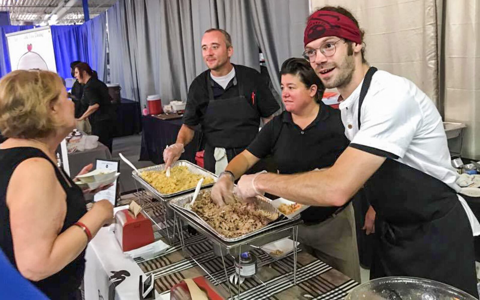 Dana Downs (center) is the chef and owner of Roost Modern Italian Dayton and Roost American in Kettering. She is pictured with staffers at the summer 2017 Miami Valley Restaurant Association restaurant week. Photo: Amelia Robinson