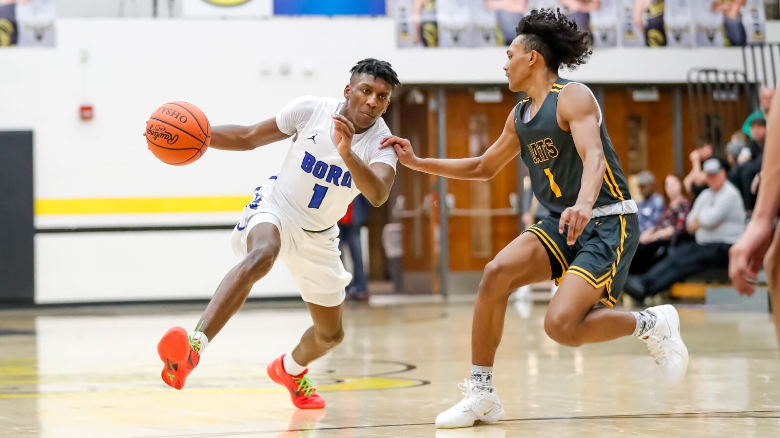 Springboro's Will Yates is defended by Springfield's CJ Wallace during a Division I district semifinal game Monday at Centerville. Michael Cooper/CONTRIBUTED