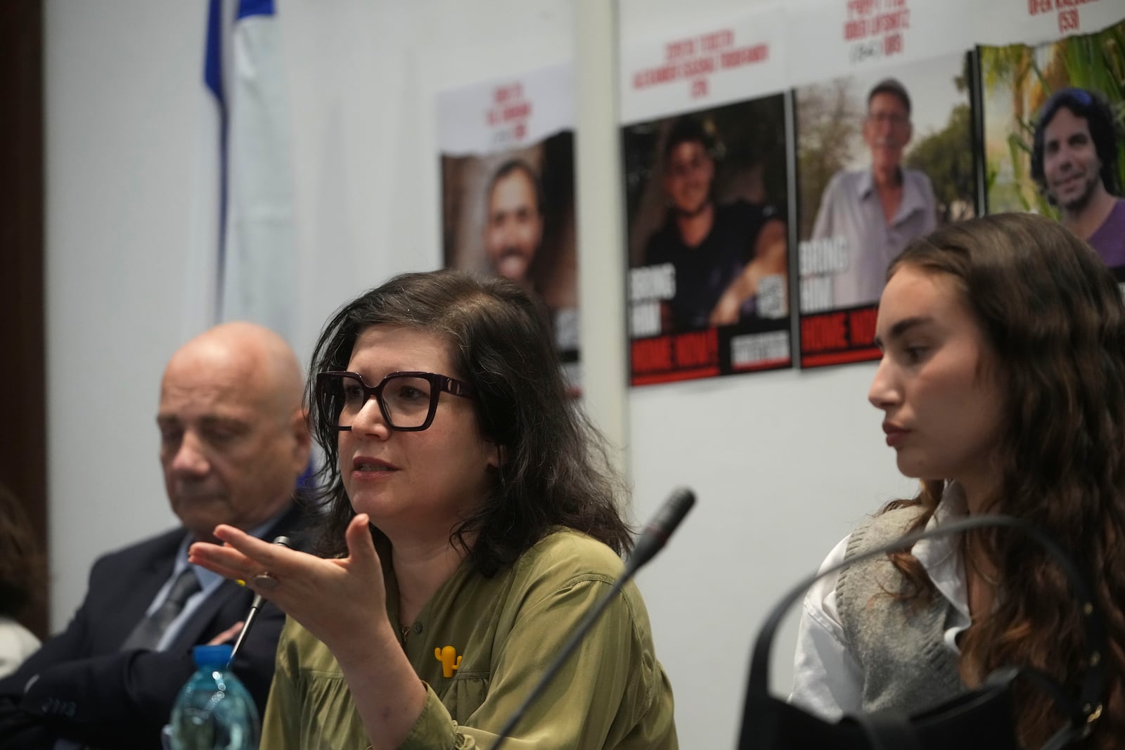 From left, Louis Har, Sharon Lifschitz, and Gaya Kalderon former Israeli hostages and relatives of some still being held by Hamas attend a press conference in Rome, Thursday, Nov. 14, 2024. (AP Photo/Alessandra Tarantino)