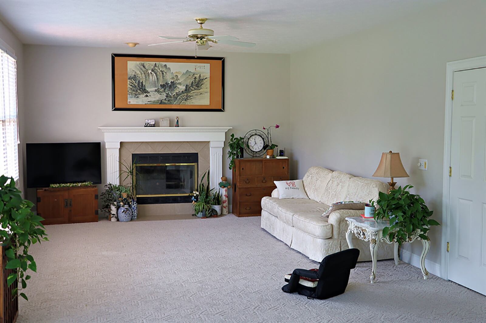 Straight off the foyer hallway is the combined family room, breakfast area and kitchen. Separated by flooring treatment, the family room has a gas fireplace with ceramic-tile surround and fluted wood mantel. CONTRIBUTED PHOTO BY KATHY TYLER