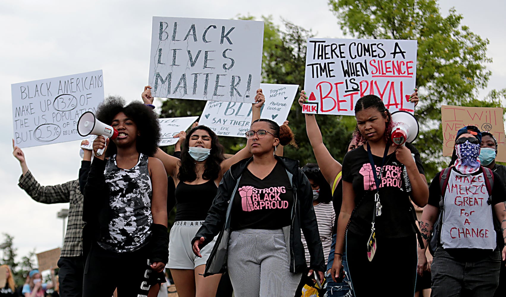 PHOTOS: Demonstrators rally for justice in Beavercreek