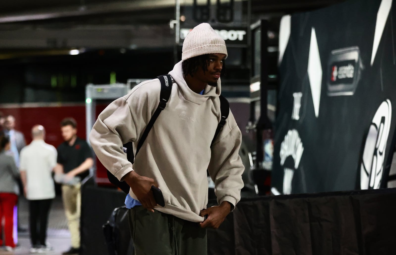 Dayton's DaRon Holmes II gets off the bus before a game against Duquesne in the quarterfinals of the Atlantic 10 Conference tournament on Thursday, March 14, 2024, at the Barclays Center in Brooklyn, N.Y. David Jablonski/Staff