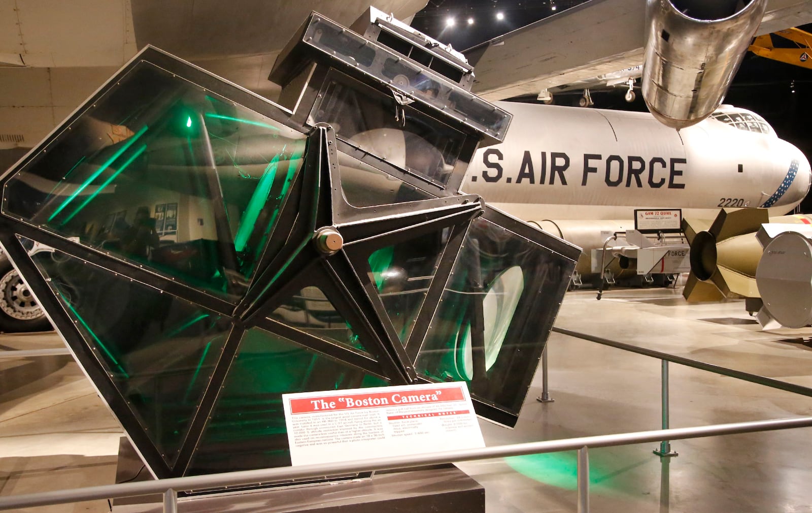 Bathed in green light next to the B-36J bomber is the largest aerial camera ever built, the Boston Camera.  Weighing in at more than 3 tons, the camera was designed to be used at 45,000 feet.    TY GREENLEES / STAFF