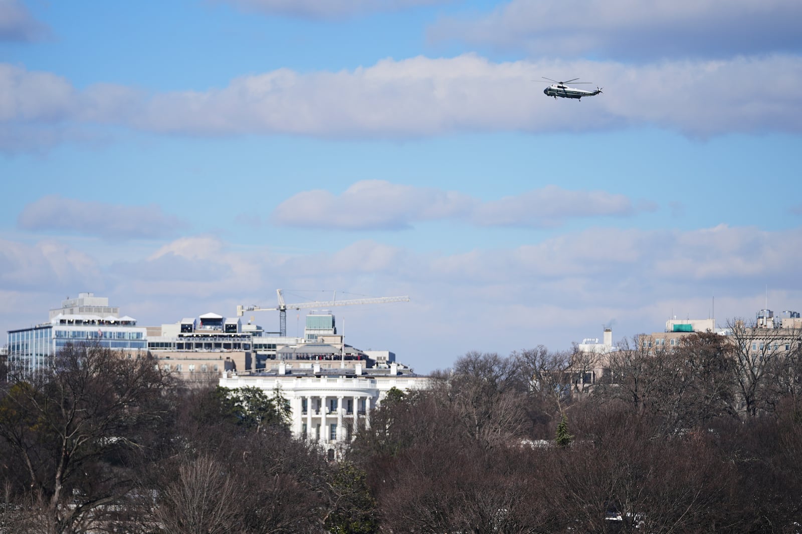 A helicopter carrying former President Joe Biden and former first lady Jill Biden flies over the White House following the 60th Presidential Inauguration, Monday, Jan. 20, 2025, in Washington. (AP Photo/Julio Cortez)