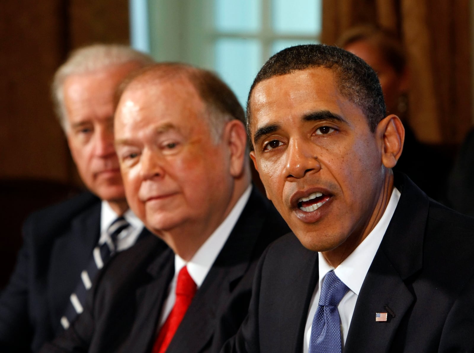 FILE - President Barack Obama and Vice President Joe Biden, left, flank former Oklahoma Sen. David Boren in the Cabinet Room of the White House in Washington, Wednesday, Oct. 28, 2009. (AP Photo/Gerald Herbert)