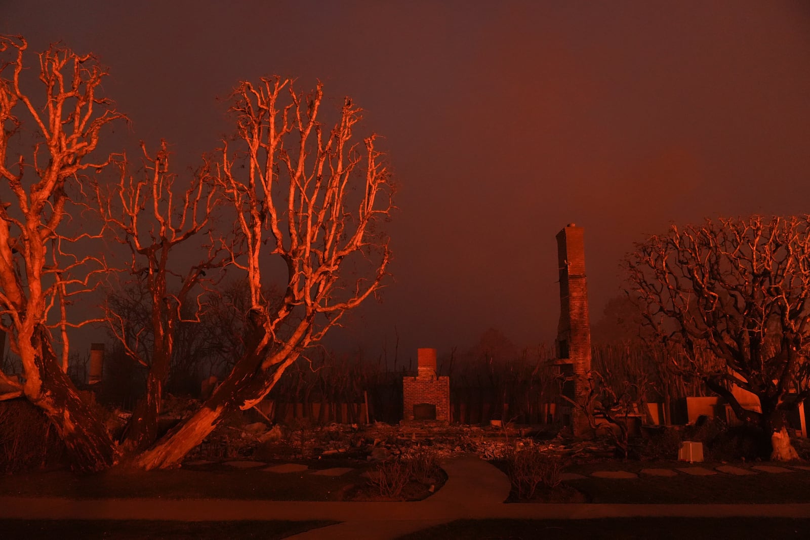 A burned property is seen in the aftermath of the Palisades Fire in the Pacific Palisades neighborhood of Los Angeles, Thursday, Jan. 9, 2025. (AP Photo/Jae C. Hong)