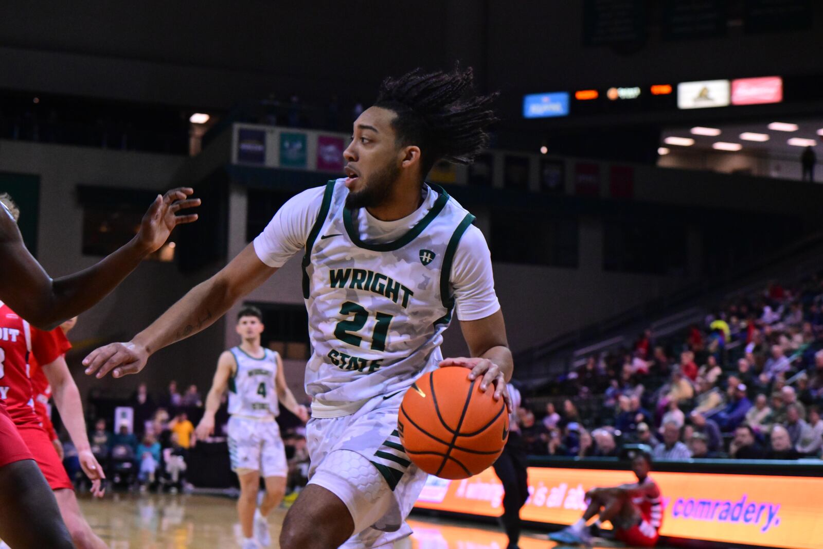 Wright State's Logan Woods drives baseline vs. Detroit Mercy at the Nutter Center on Jan. 25, 2025. Joe Craven/Wright State Athletics