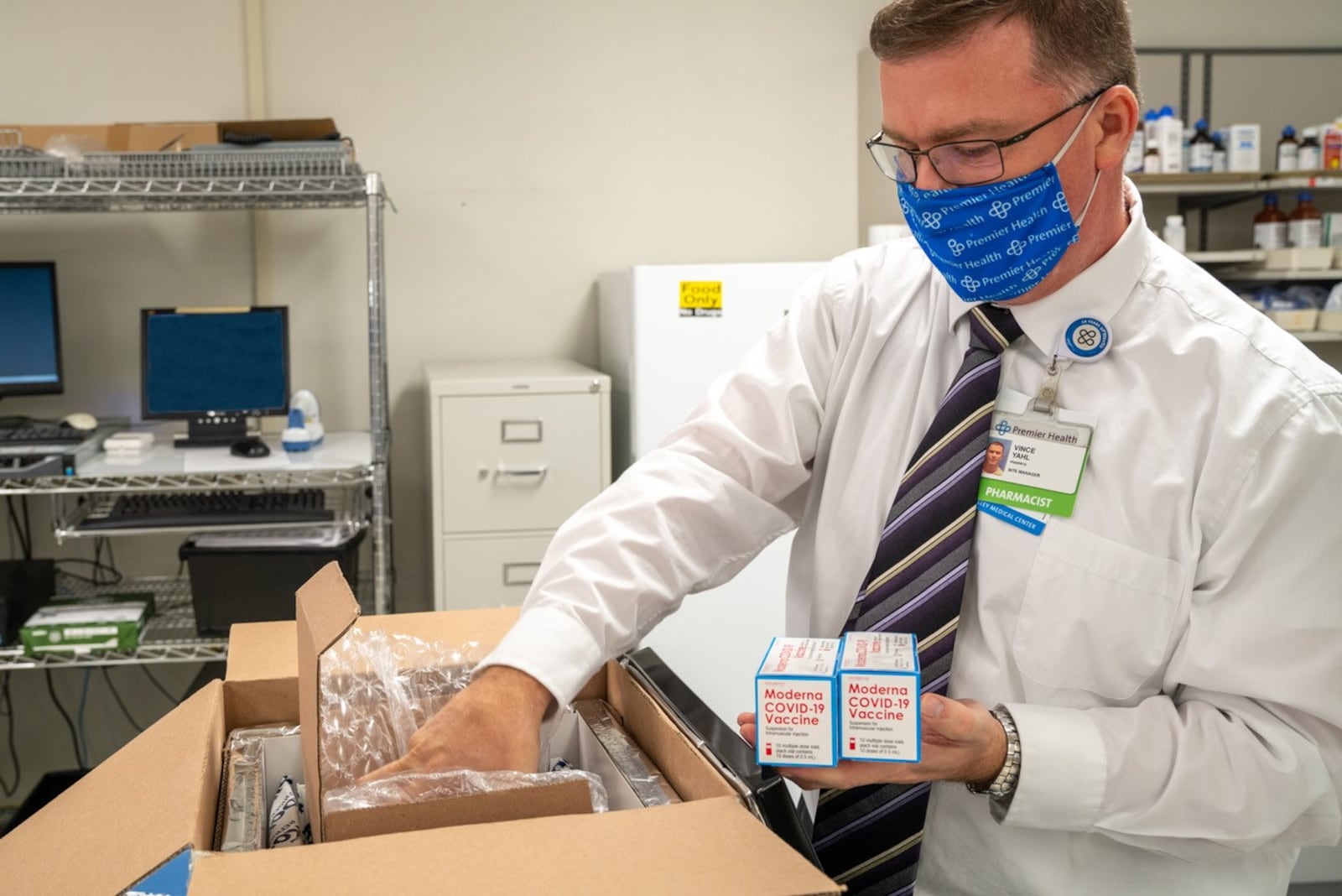 Upper Valley Medical Center in Troy received 600 doses of the Moderna coronavirus vaccine Monday morning. Vince Yahl, the pharmacy site manager at Upper Valley, unpacks the doses.