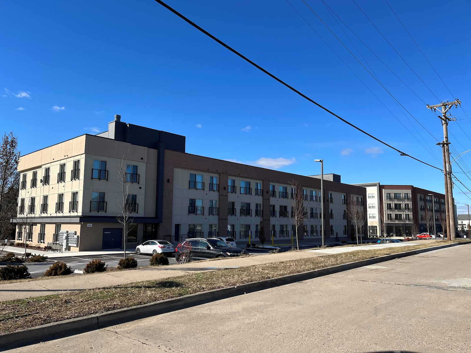 The backside of the second phase of the Flats at South Park apartments. The second phase created 51 new apartments, which opened recently. The first phase, just north of the new building, offers 43 apartments. CORNELIUS FROLIK / STAFF