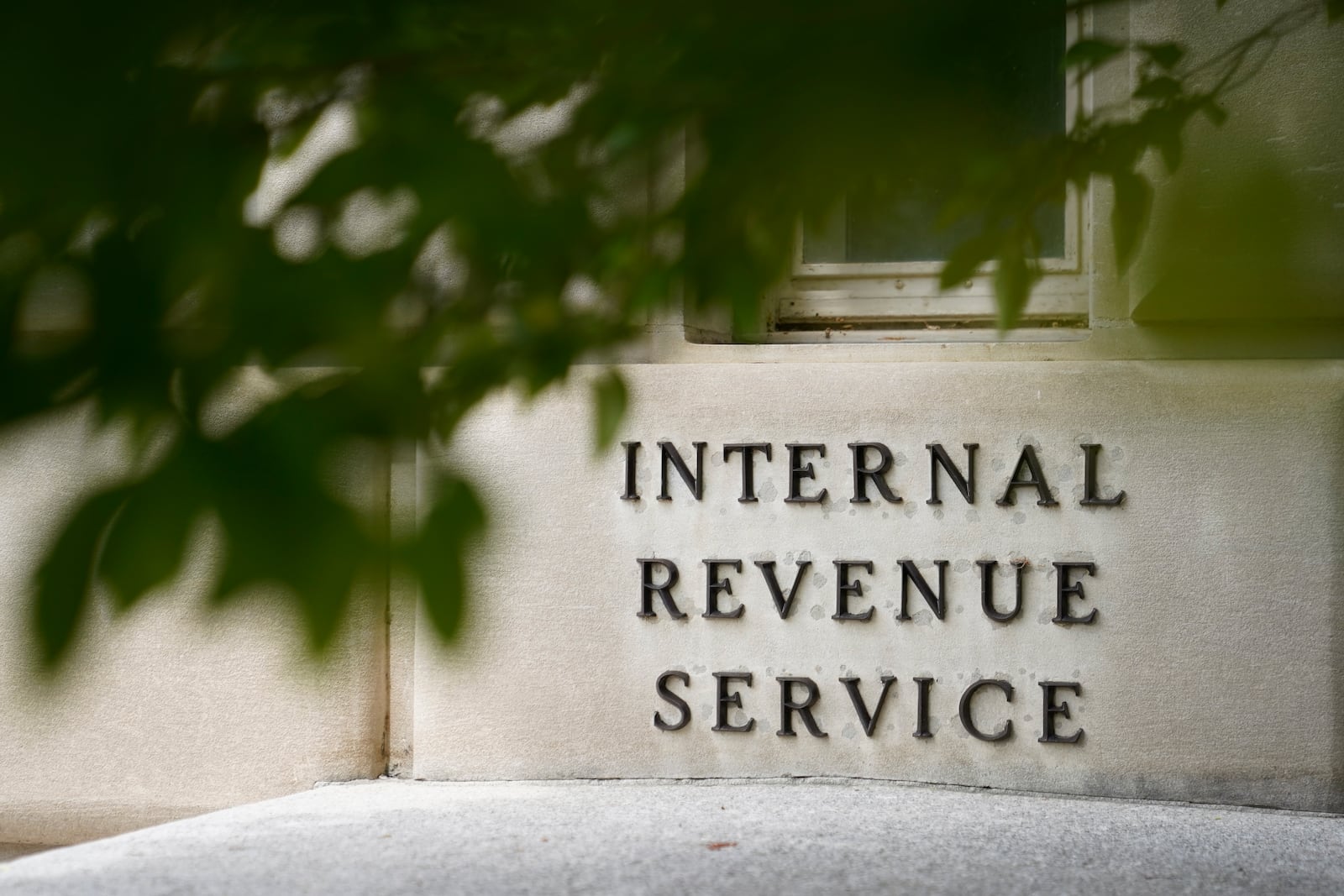 FILE - A sign is displayed outside the Internal Revenue Service building on May 4, 2021, in Washington. (AP Photo/Patrick Semansky, File)