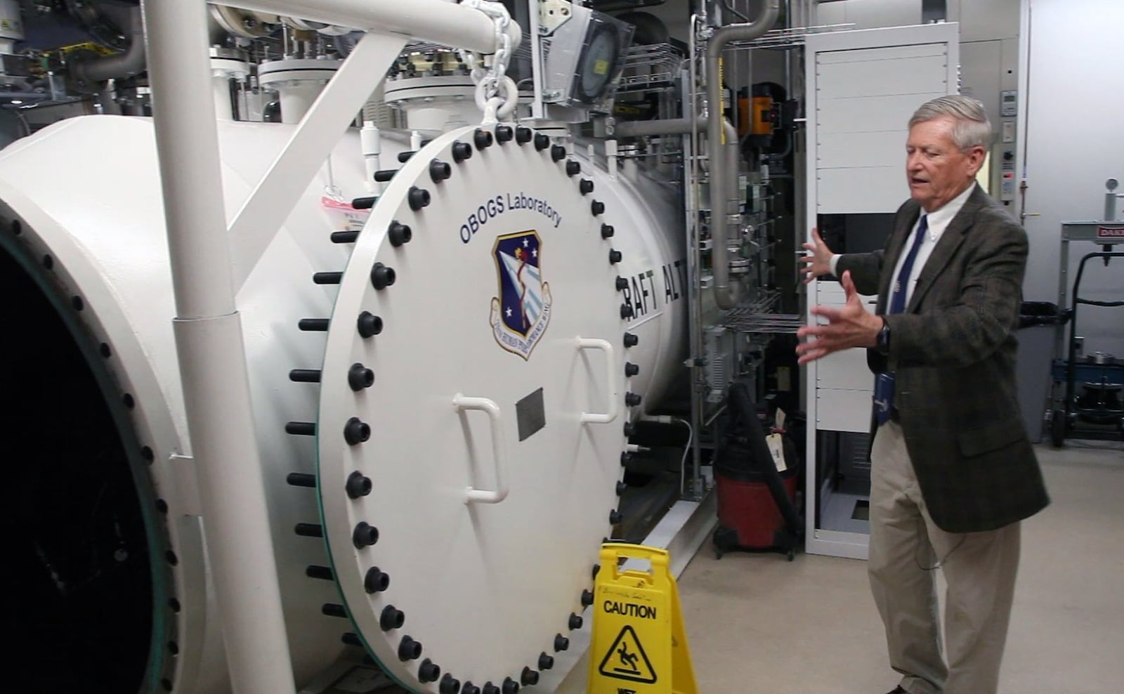 George W. Miller, OBOGS research team leader with one of two altitude chambers used to test the on-board oxygen generating system (OBOGS) from the F-35 Lightning fighter jet. Reported problems with the system has scientists at the 71th Human Performance Wing at Wright-Patterson Air Force Base researching the system. TY GREENLEES / STAFF