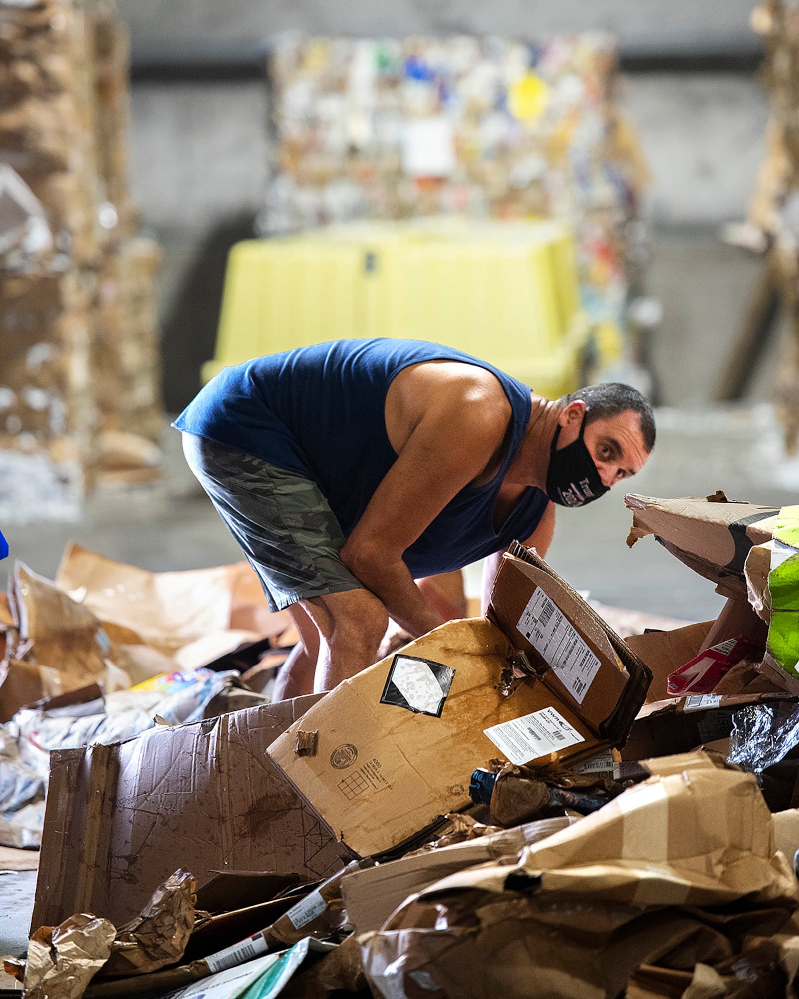 Ned Applegate, 88th Force Support Squadron, sorts through a pile of cardboard Sept. 22 in the Recycling Center at Wright-Patterson Air Force Base. The center is run through a memorandum of agreement between 88 FSS and the 88th Civil Engineer Group. U.S. AIR FORCE PHOTO/R.J. ORIEZ