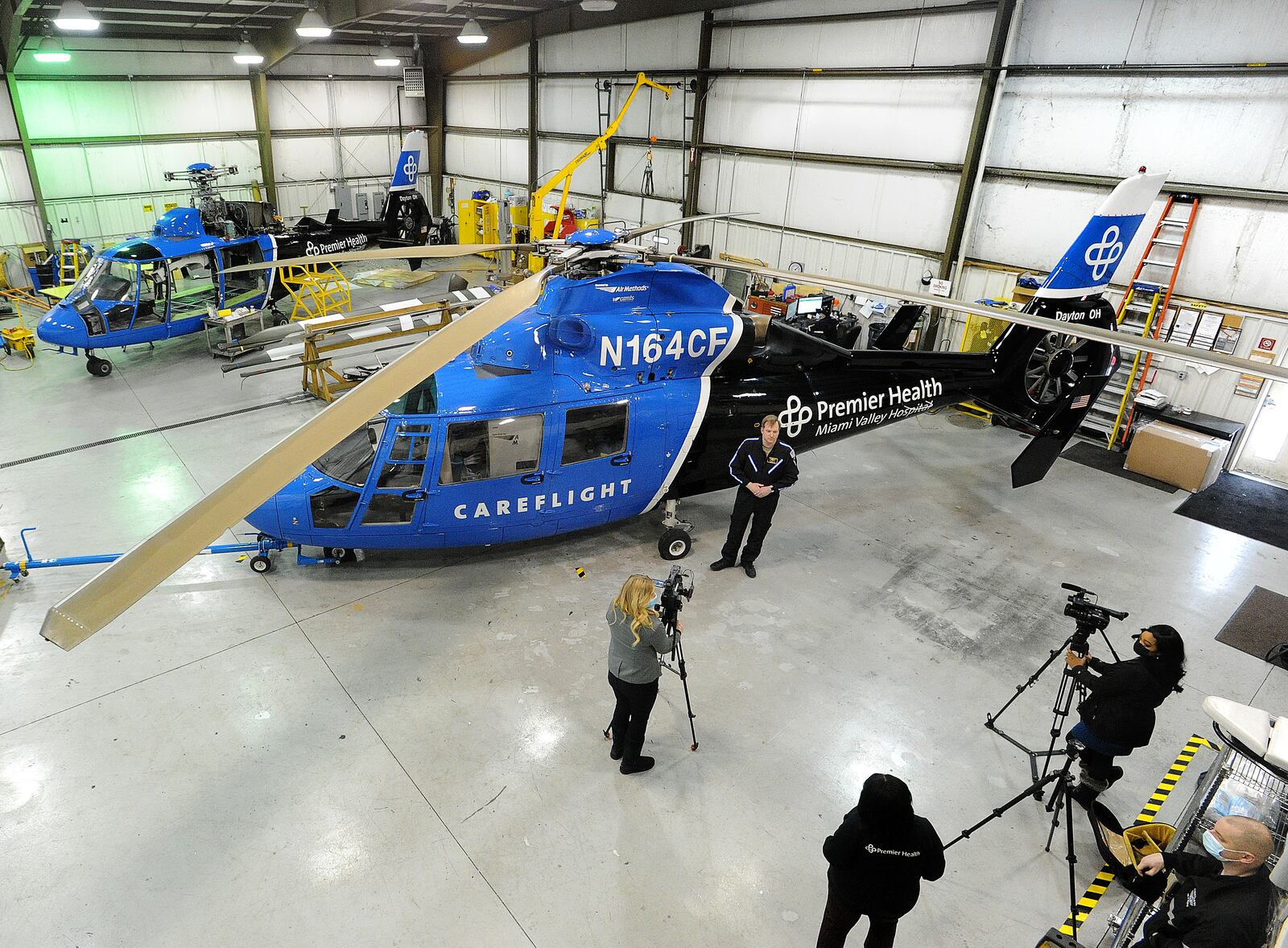 CareFlight pilot, Nick Stevenson, talks to the media, Friday, Feb. 12, 2021 at the Moraine Airpark, about flying and preparation of the aircraft for cold weather. MARSHALL GORBY\STAFF