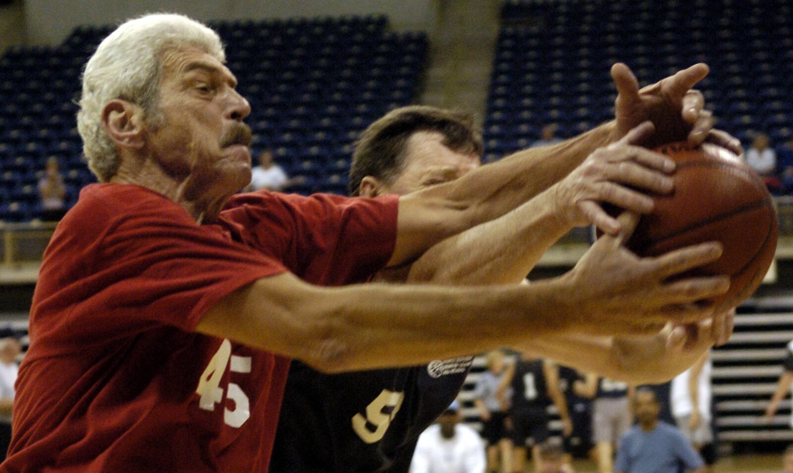 John Beale/Post-Gazette
Pittsburgh June 8, 2005
Bill Chmieliewski, left, playing for the Hamilton Ohio Eagles, goes after a rebound during a Senior Olympics game against the New Jersey All Stars at the Petersen Events Center. Chmieliewski is 6'11'' and played for the University of Dayton and led the Flyers to an NIT championship in 1962.  PUBLISHED CAPTION: John Beale/Post-Gazette
senior games: day 6
Bill Chmielewski, left, playing for the Hamilton Ohio Eagles, goes after a rebound in a Senior Olympics game against the New Jersey All-Stars at the Petersen Events Center. Chmielewski, 6 feet 10, \uFEFF\uFEFFplayed for the University of Dayton and led the Flyers to an NIT championship in 1962. 
More Senior Olympics, Page C-6   Original Filename: Beale Chmieliewski.1.jpg