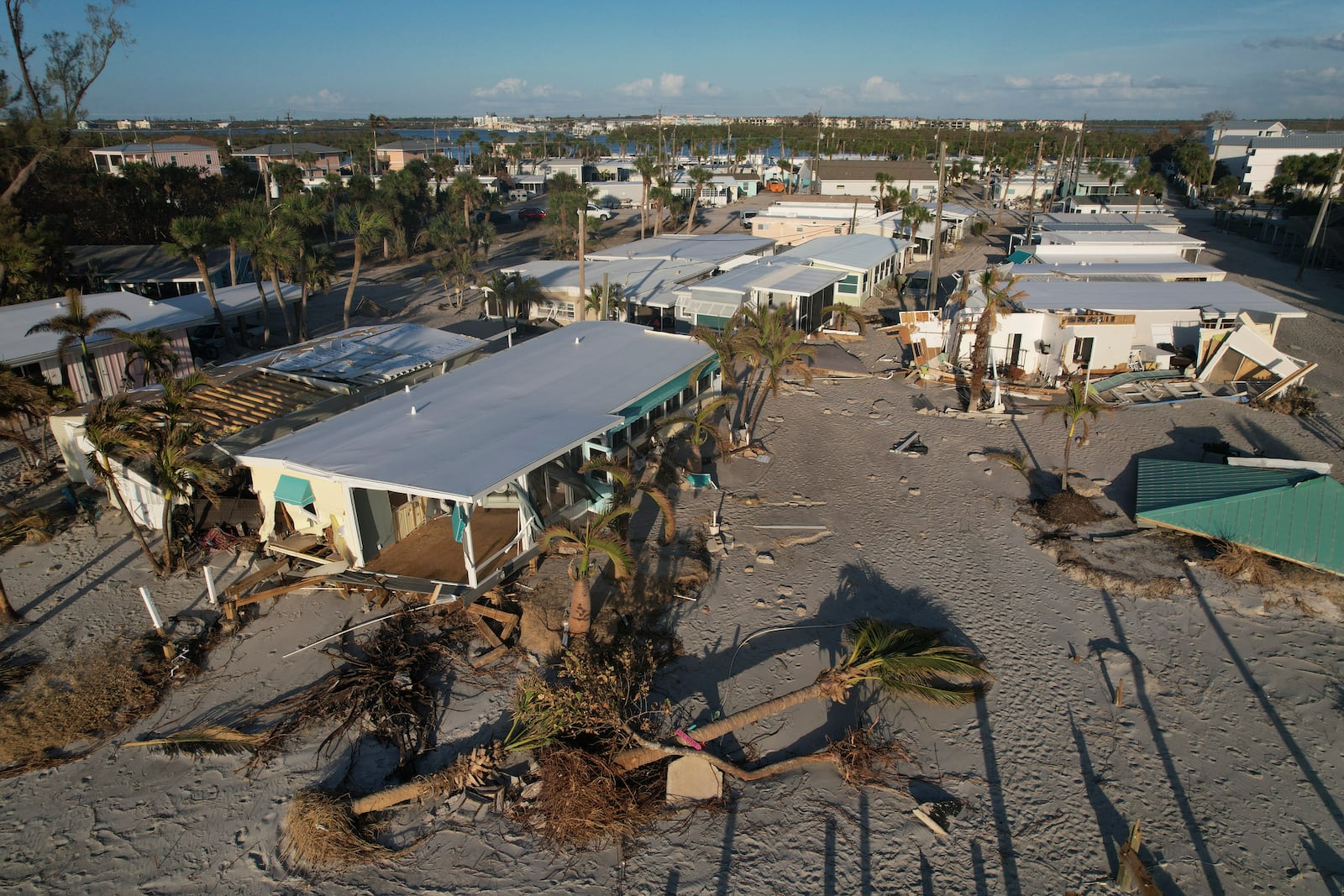 Damage from Hurricane Milton is seen at a mobile home community on Manasota Key, in Englewood, Fla., Sunday, Oct. 13, 2024. (AP Photo/Rebecca Blackwell)