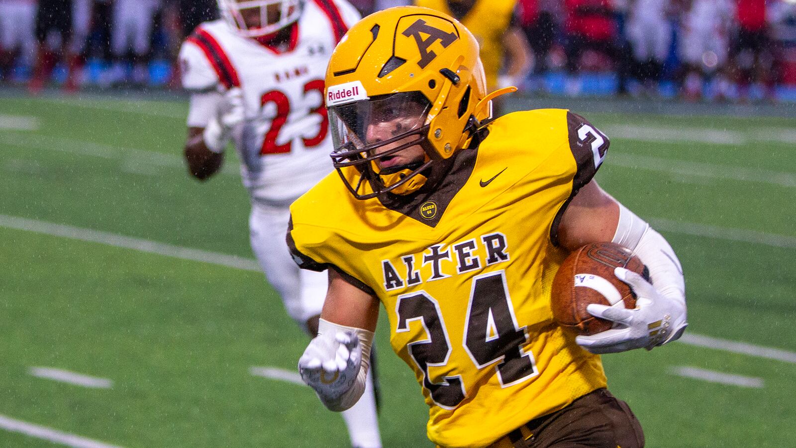 Alter's Noah Jones turns the corner on a first-half touchdown run during Trotwood-Madison's 35-27 victory Thursday night at Doug Adams Stadium in Xenia. Jeff Gilbert/CONTRIBUTED