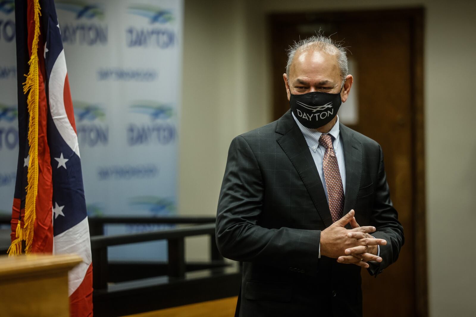 The City of Dayton Commission Chambers was filled Monday morning to welcome the new Director and Chief of Police, Kamran Afzal. The swearing in ceremony was held a 10a.m. and Chief Afzal's family attended. JIM NOELKER/STAFF