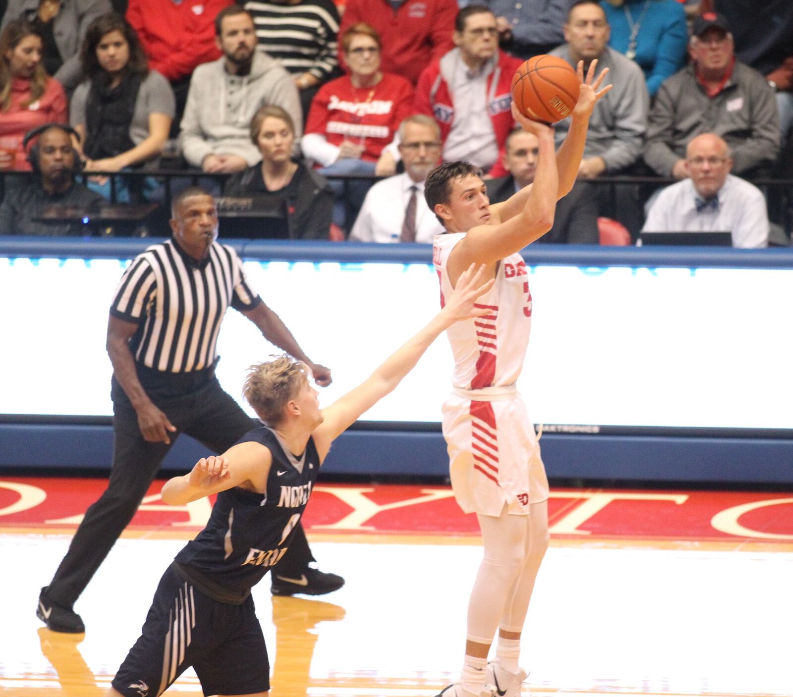 Dayton’s Ryan Mikesell shoots against North Florida on Wednesday, Nov. 7, 2018, at UD Arena.