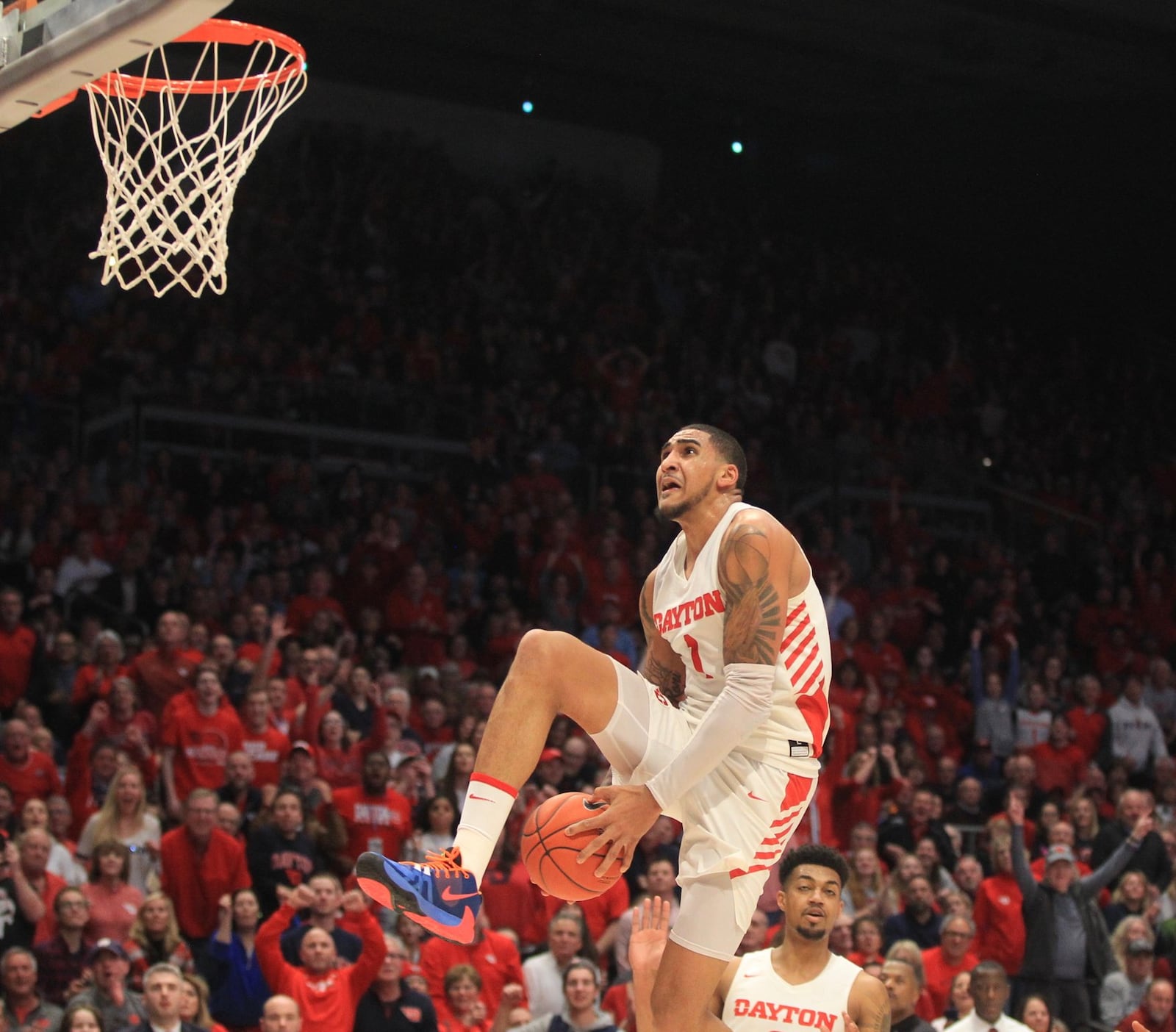 Dayton’s Obi Toppin dunks against George Washington on Saturday, March 7, 2020, at UD Arena. David Jablonski/Staff