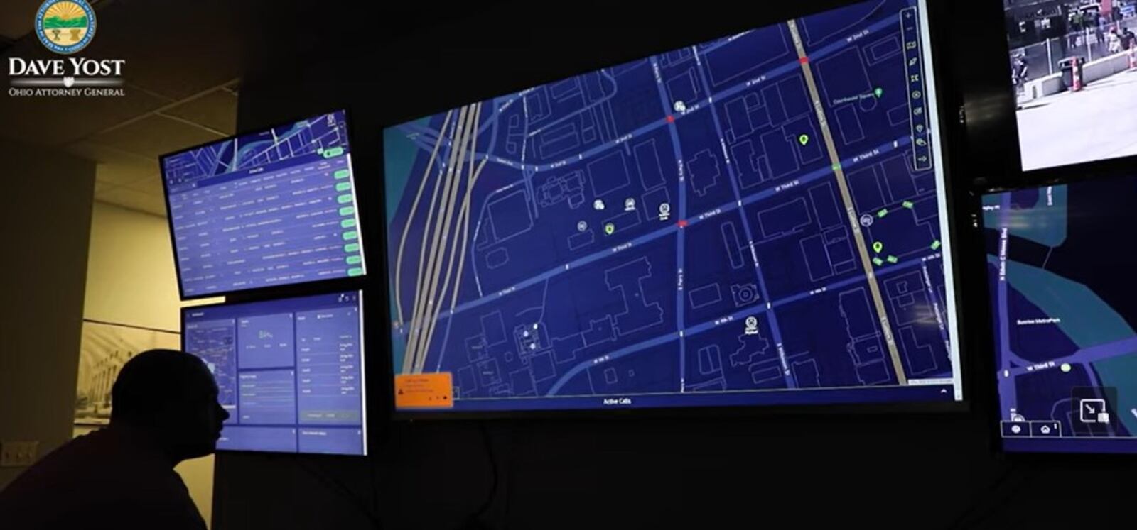 The Fusus system is shown here on video screens. The large screen shows a map of downtown, including camera locations. CONTRIBUTED