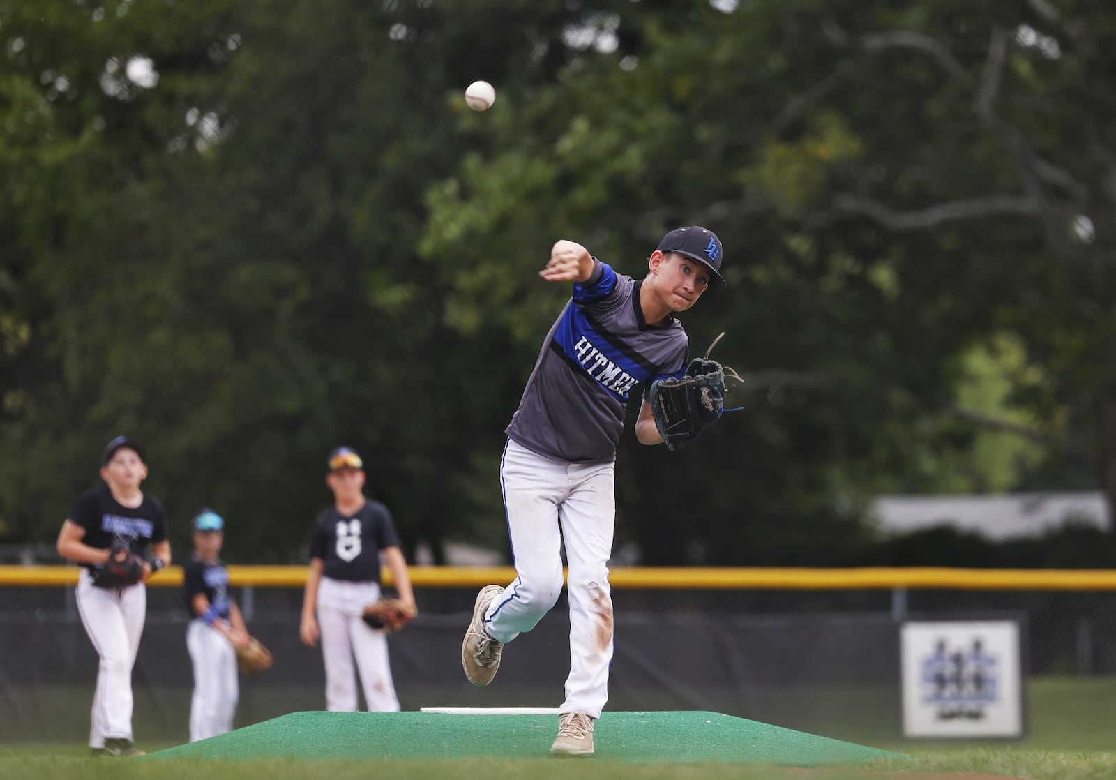 Braydon Caudill pitches during Hamilton West Side Little League practice Wednesday, July 31, 2024. The team won the state tournament and are heading to represent Ohio in Whitestown, Indiana for the Great Lakes Region Tournament. NICK GRAHAM/STAFF