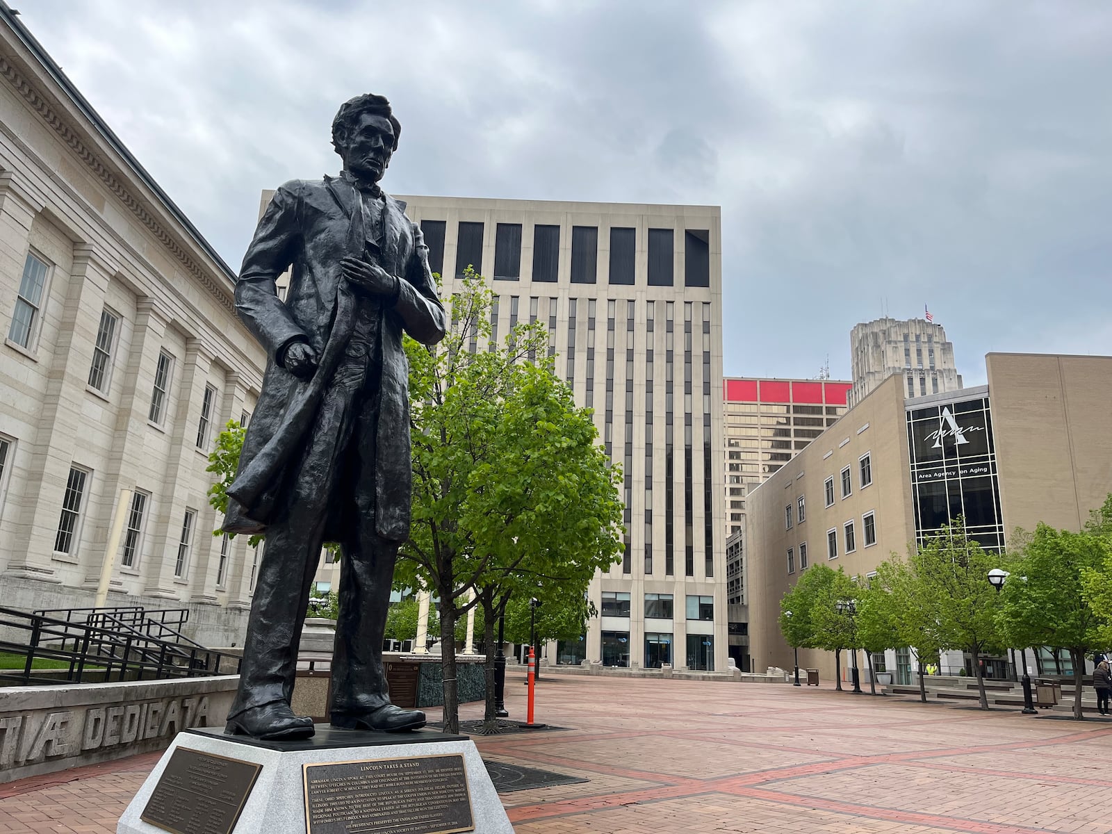 A statue of Abraham Lincoln greets visitors to downtown Dayton's Courthouse Square. The 11-foot-tall artwork commemorates Lincoln's speech in Dayton on the steps of the Old Court House on Sept. 17, 1859. CORNELIUS FROLIK / STAFF