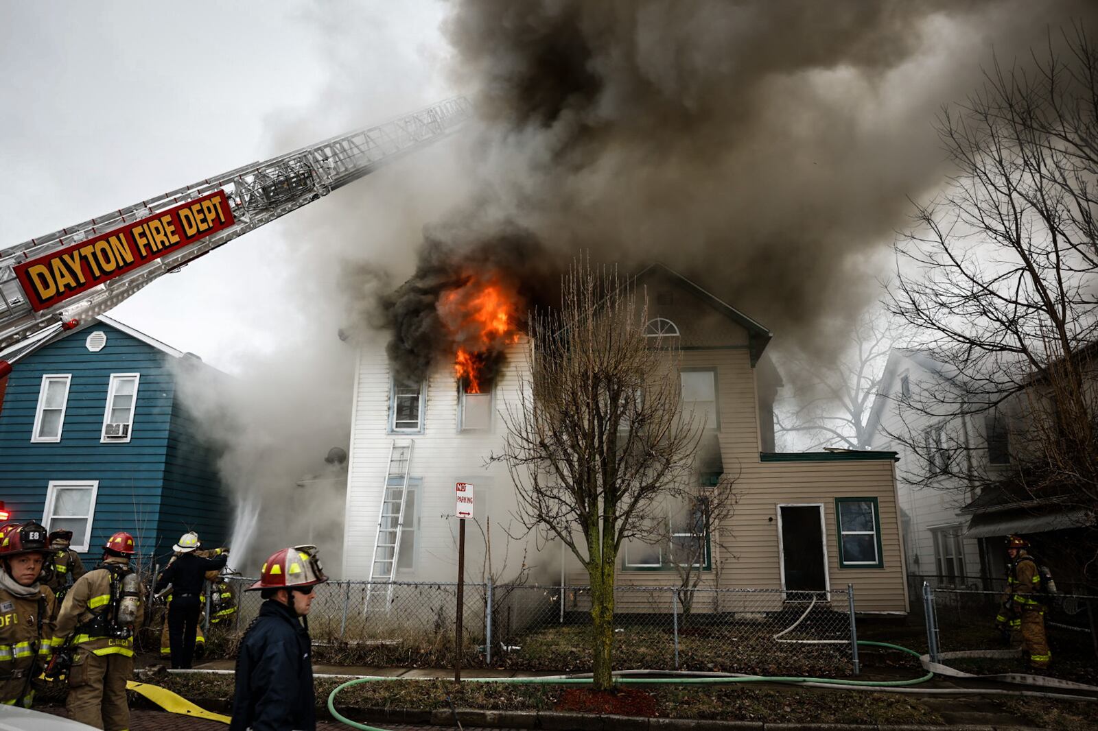 Crews ordered an emergency demolition of a vacant two-story house in the 100 block of South June Street in Dayton that was destroyed by fire Thursday afternoon, Feb. 16, 2023. JIM NOELKER/STAFF