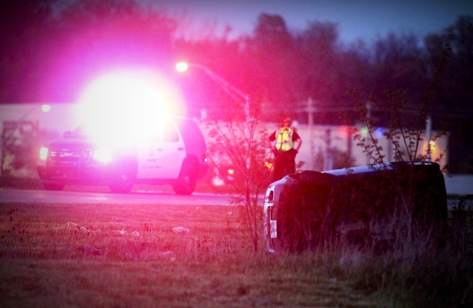 This SUV came to rest on its side after crashing Friday night, May 1, 2015, on the exit to state Route 73 from I-75 North in Warren County, police said. (Jim Noelker/Staff)