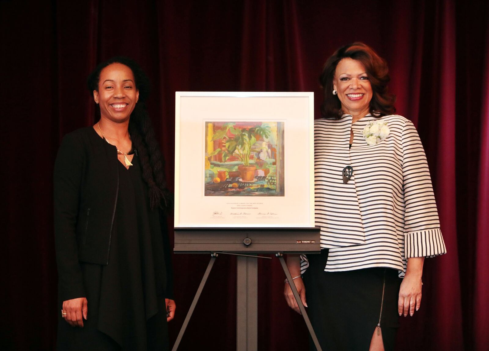 Dayton Contemporary Dance Company Associate Artistic Director Crystal Michelle (left) and Dayton Contemporary Dance Company CEO Ro Nita Hawes-Saunders accepting the Ohio Arts Council Irma Lazarus Award in May 2018. CONTRIBUTED