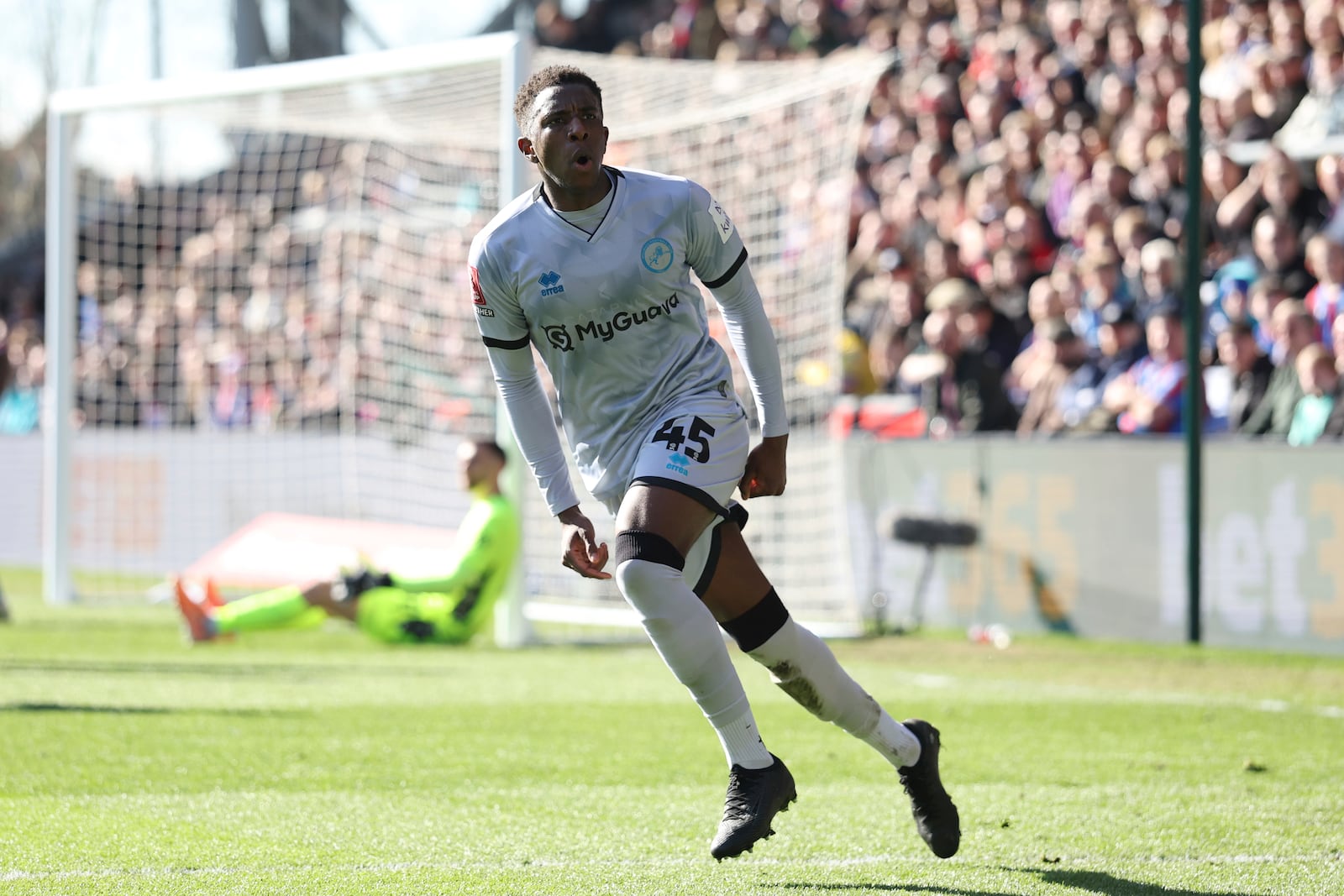 Millwall's Wes Harding celebrates after scoring his side's opening goal during the English FA Cup soccer match between Crystal Palace and Millwall at Selhurst Park, London, England, Saturday, March 1, 2025. (AP Photo/Ian Walton)