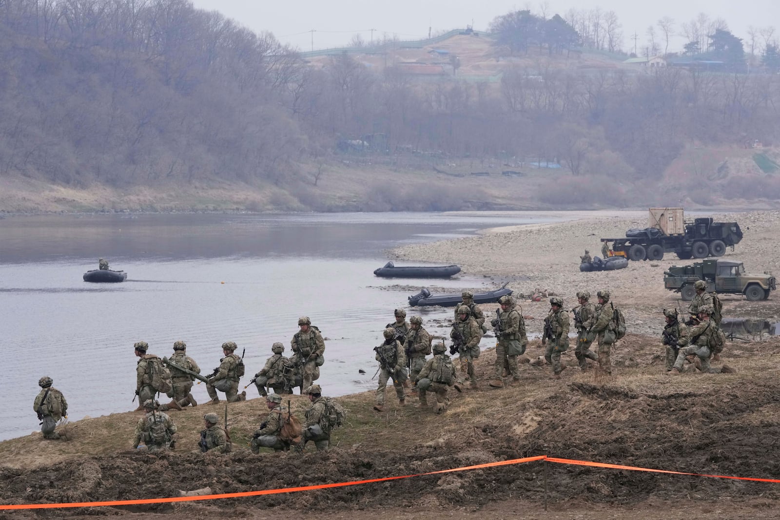 U.S. Army soldiers participate in a joint river-crossing exercise between South Korea and the United States as a part of the Freedom Shield military exercise in Yeoncheon, South Korea, Thursday, March 20, 2025. (AP Photo/Ahn Young-joon)