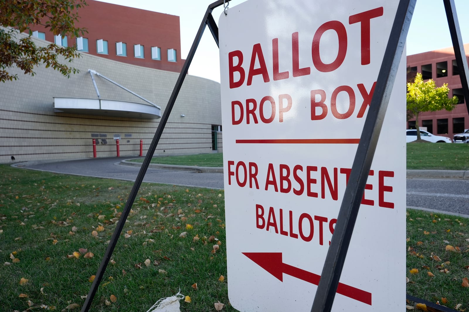 A drop slot for voting ballots and absentee applications is shown outside of the Warren City Hall complex Thursday, Oct. 24, 2024, in Warren, Mich. (AP Photo/Paul Sancya)