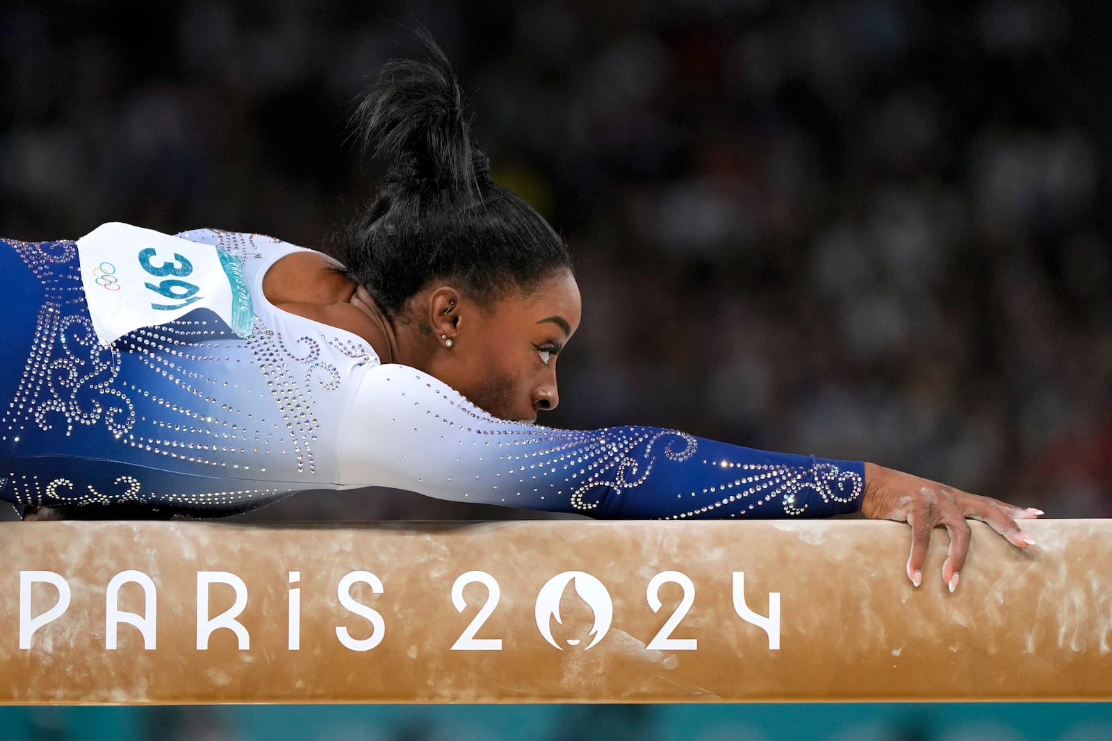 FILE - Simone Biles, of the United States, competes during the women's artistic gymnastics individual balance beam finals at Bercy Arena at the 2024 Summer Olympics, Monday, Aug. 5, 2024, in Paris, France. (AP Photo/Francisco Seco, File)