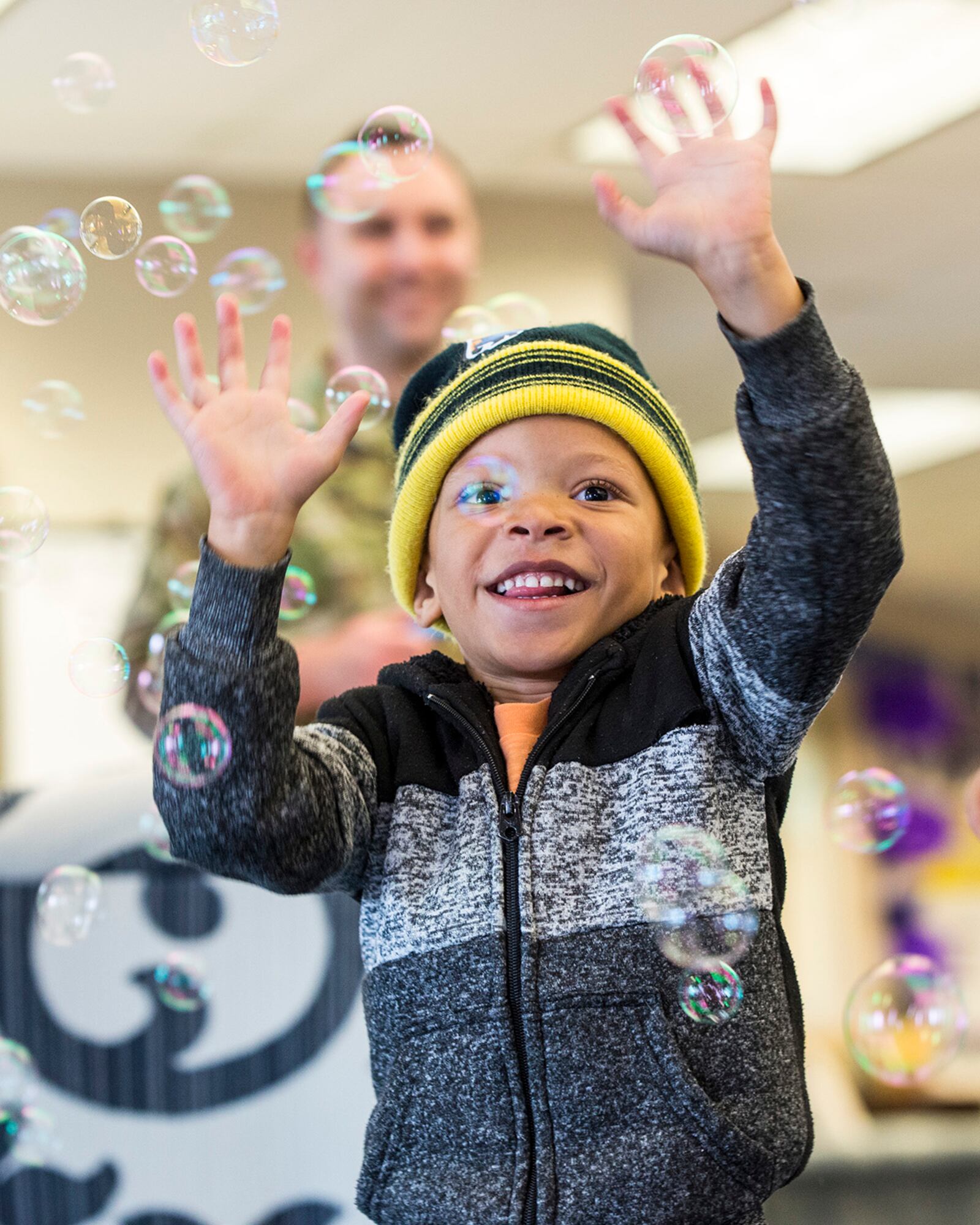 A child plays with bubbles at Wright Field South Child Development Center on April 29 at Wright Patterson Air Force Base. U.S. AIR FORCE PHOTO/JAIMA FOGG