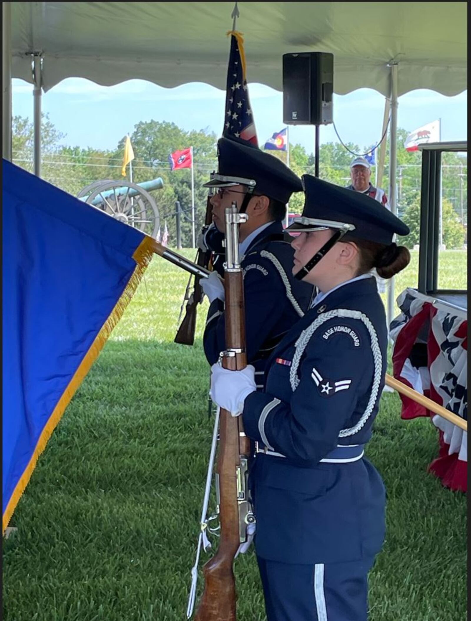 The Wright-Patterson Air Force Base Honor Guard posted the colors as part of the Memorial Day ceremonies Monday at the Dayton National Cemetery. NICK BLIZZARD/STAFF