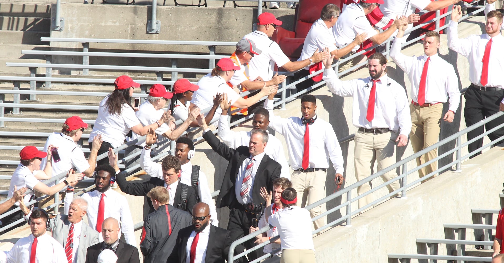 Photos: Urban Meyer jogs across field at Ohio Stadium