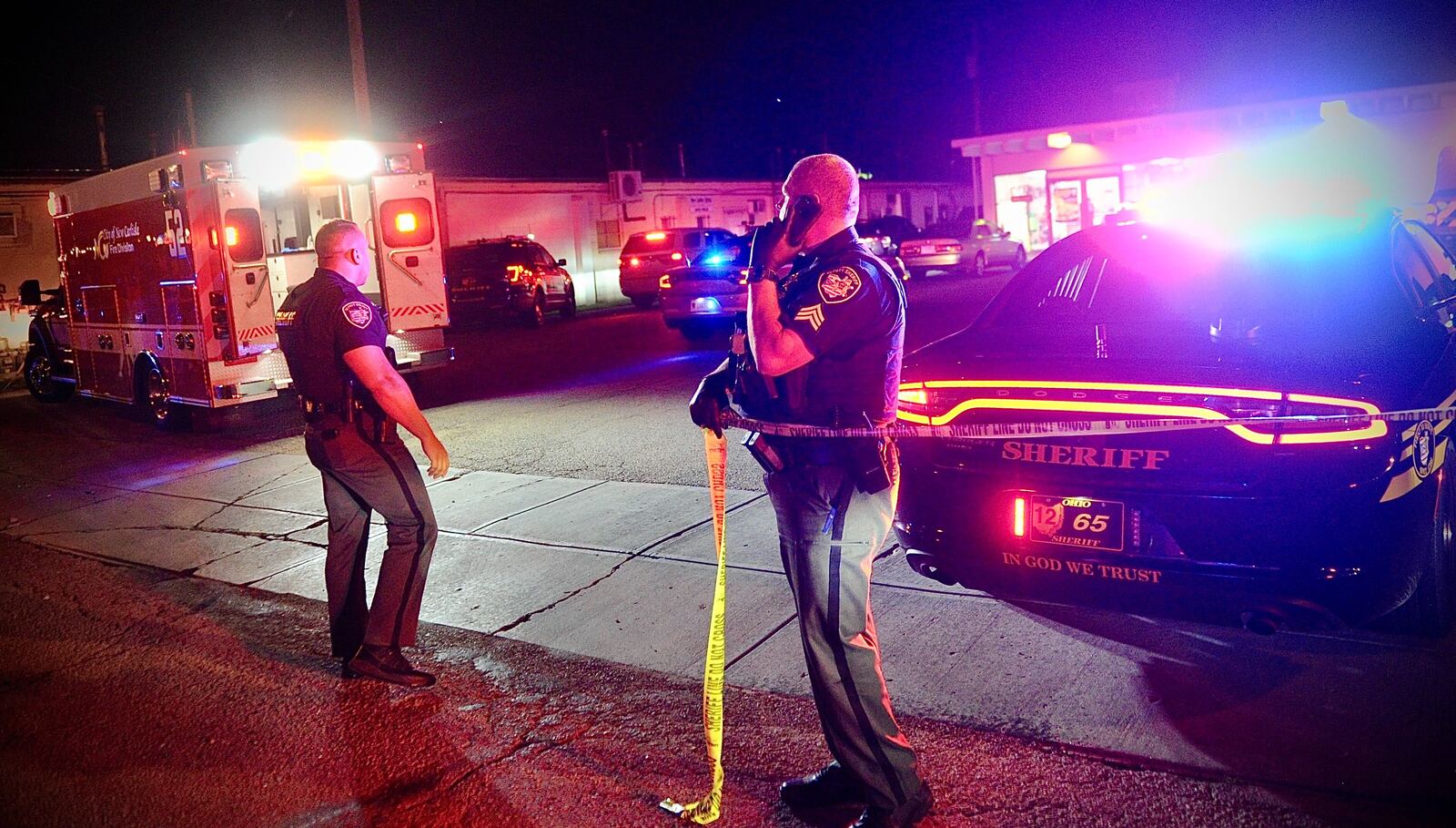 Clark County Sheriff's deputies set up a perimeter after a shooting at a New Carlisle pizza business on Sunday, June 20, 2021. MARSHALL GORBY/STAFF