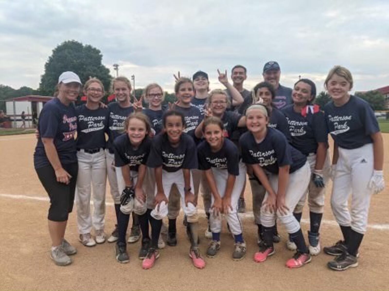 Trisha Greear, left, helped start a softball program Patterson Park Youth Baseball organization