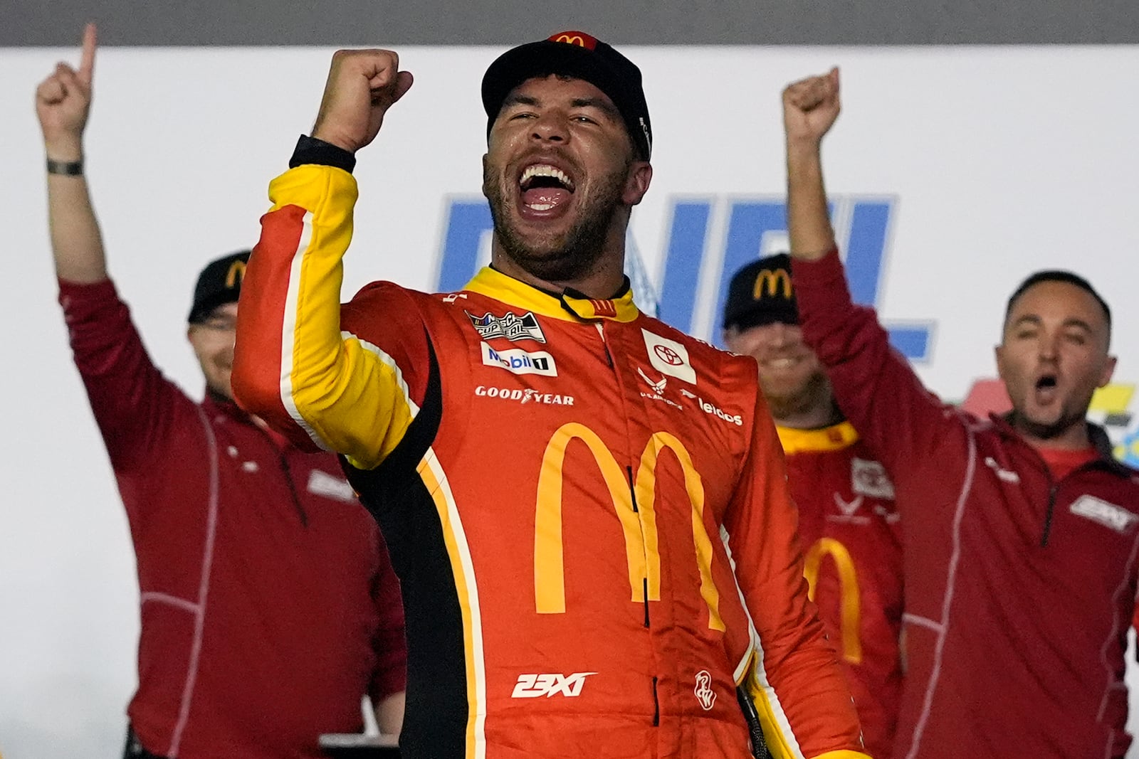 Bubba Wallace celebrates in Victory Lane after winning the first of two NASCAR Daytona 500 qualifying auto races at Daytona International Speedway, Thursday, Feb. 13, 2025, in Daytona Beach, Fla. (AP Photo/John Raoux)