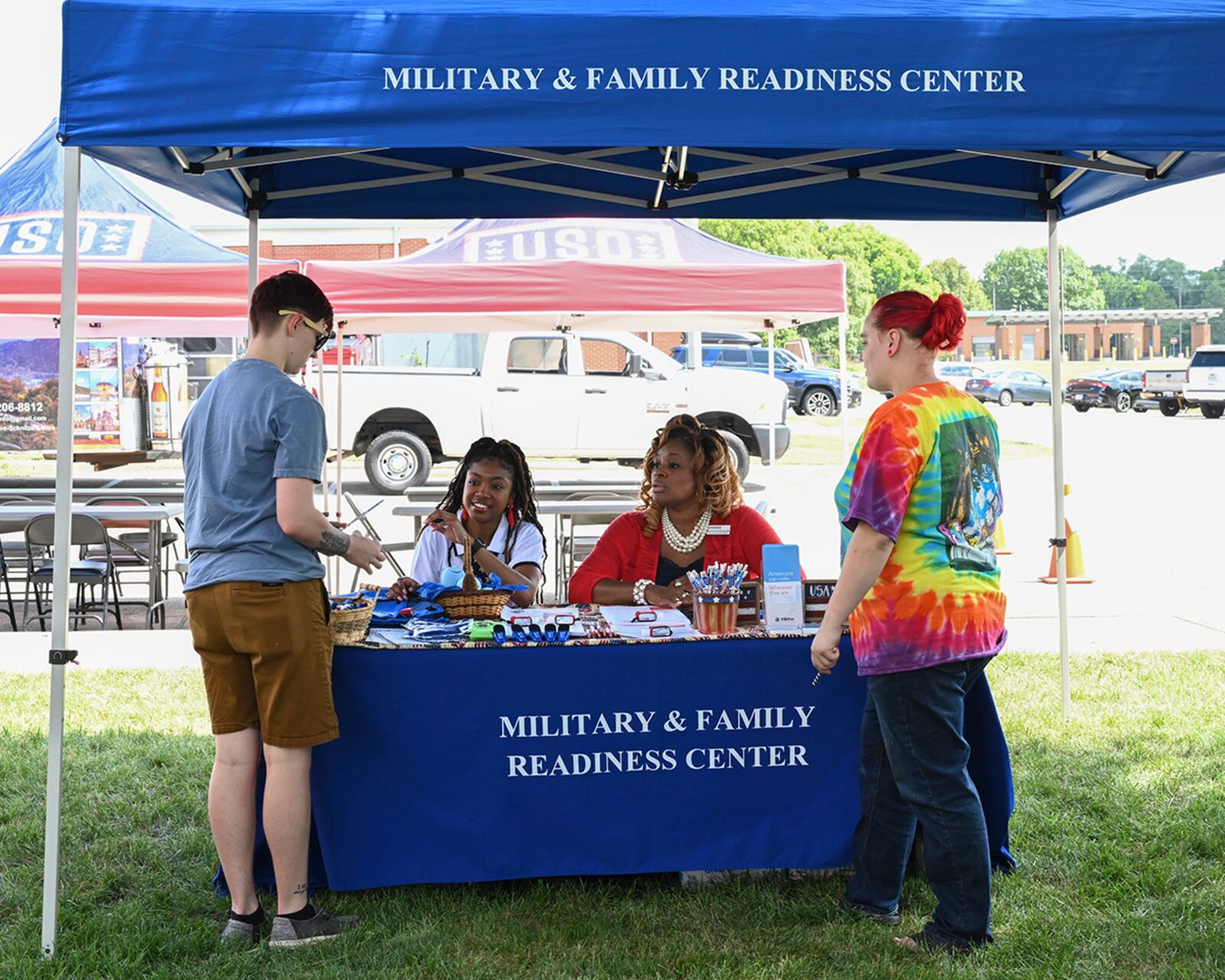 Festivalgoers learn about Military & Family Readiness Center programs and resources at the Women’s Equality Day festival Aug. 26 on Wright-Patterson Air Force Base. The day’s events also included a breakfast, panel of female speakers and self-guided tour at the National Museum of the U.S. Air Force. U.S. AIR FORCE PHOTO/JAIMA FOGG