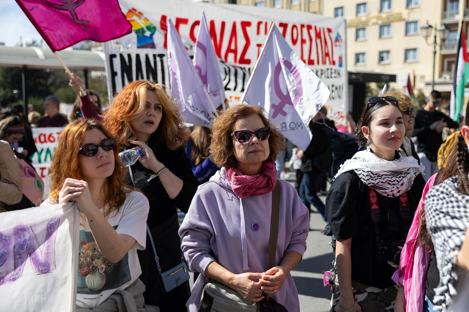 Protesters take part in a rally marking International Women's Day, in Athens, Saturday, March 8, 2025. (AP Photo/Yorgos Karahalis)